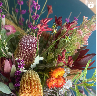 A lush native flower arrangement in bold colours by Bold Botanicals