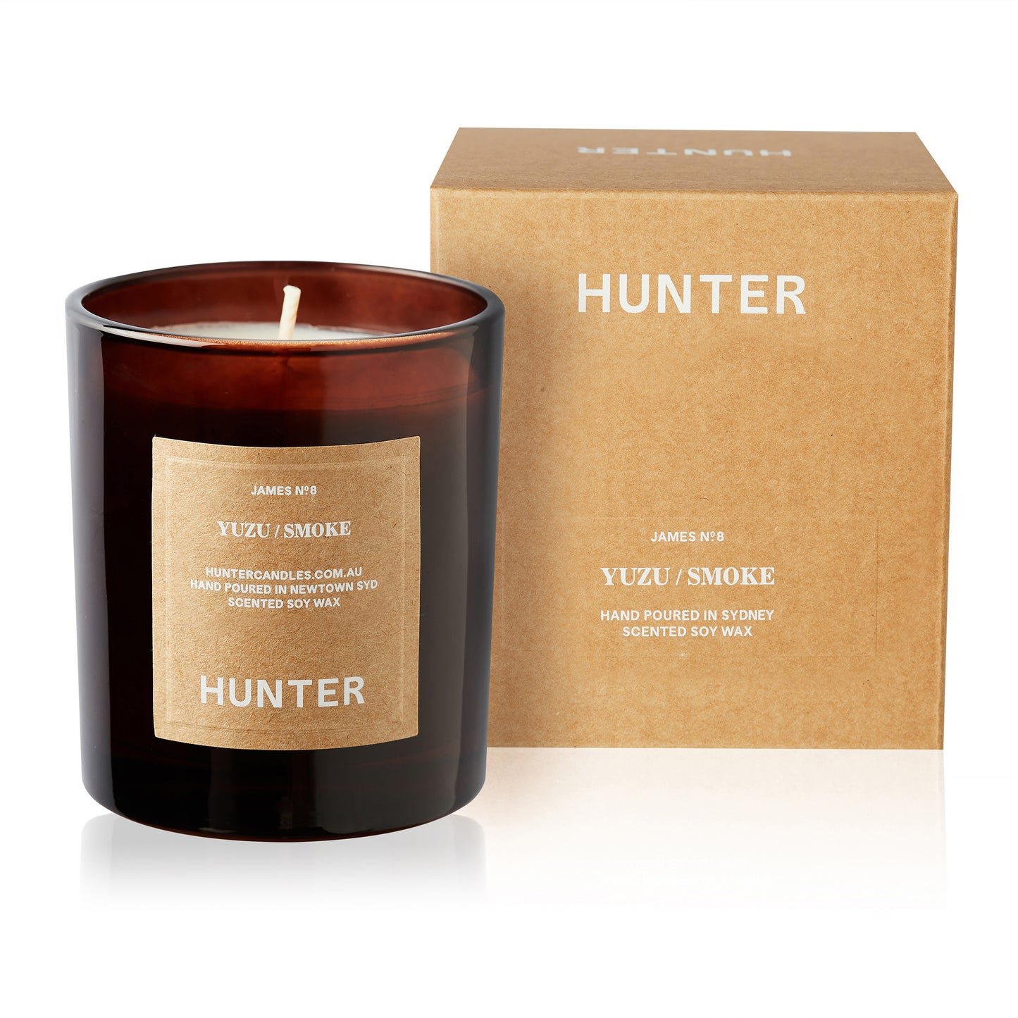 Hunter soy candle packaged in dark glass and fragranced Yuzu and Smoke. Hand made in Sydney, Australia.